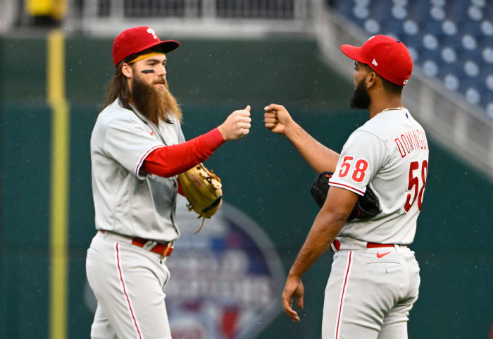 Brandon Marsh celebrates with Seranthony Dominguez.